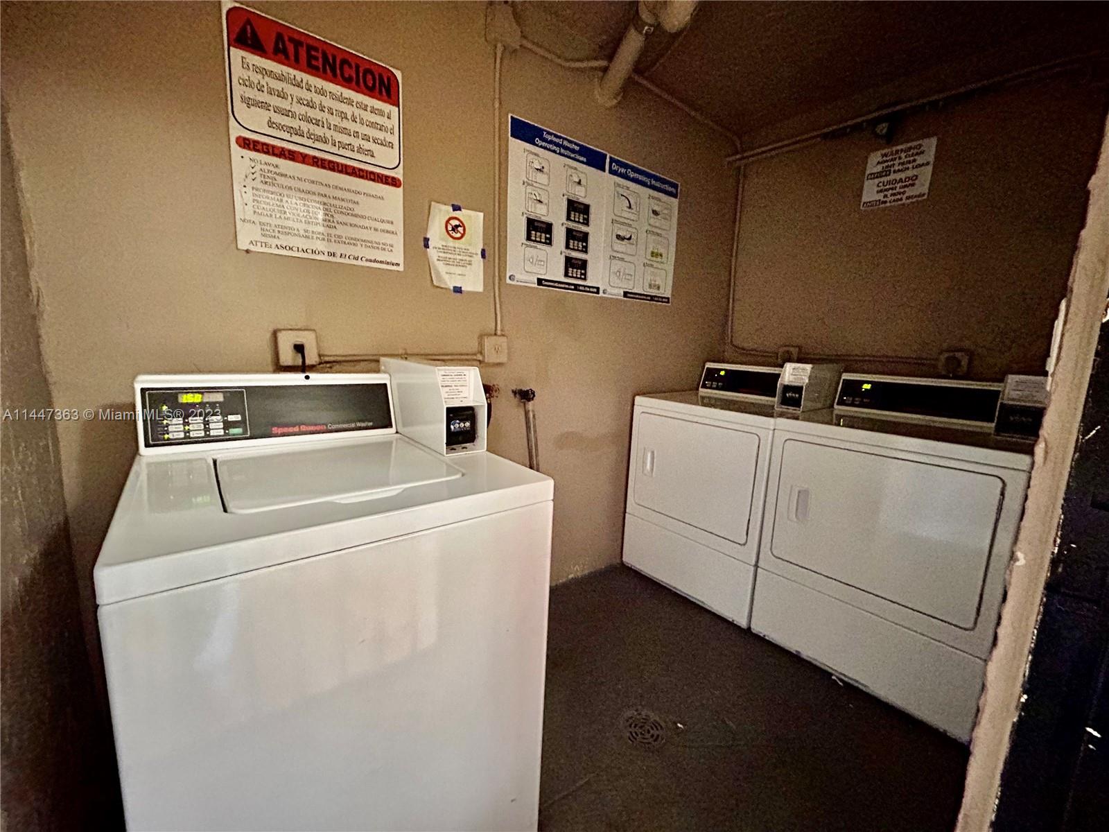 5201 Northwest 7th Street, Unit 403 Miami, FL 33126 - Photo 17 of 17 a utility room with dryer and washer
