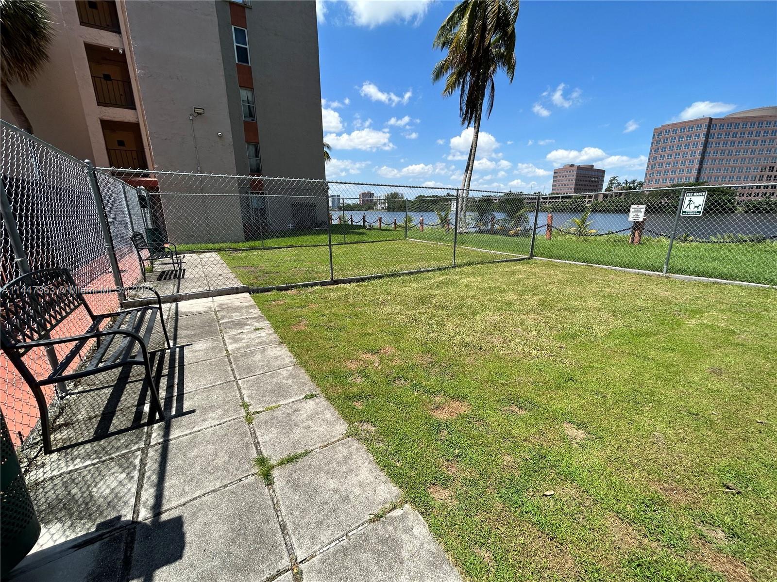 5201 Northwest 7th Street, Unit 403 Miami, FL 33126 - Photo 3 of 17 a view of a volley ball court