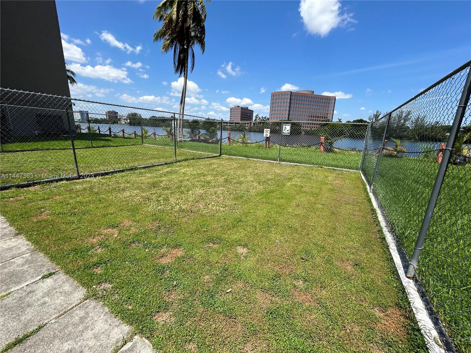 5201 Northwest 7th Street, Unit 403 Miami, FL 33126 - Photo 4 of 17 a view of a basketball court