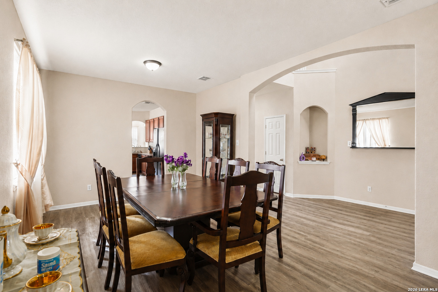 213 Wildcat Cibolo, TX 78108 - Photo 6 of 34 a view of a dining room with furniture and wooden floor