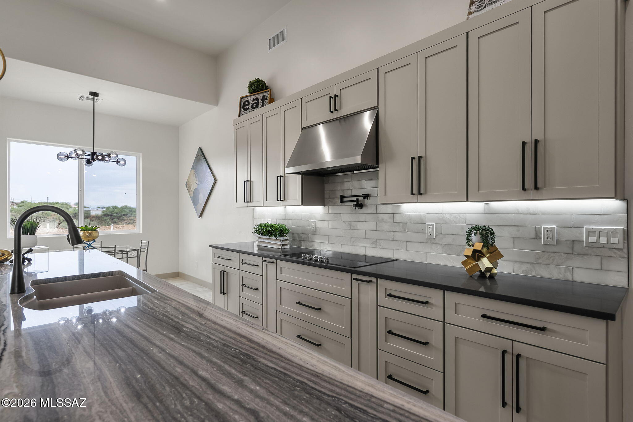 1557 Pinguinos Court Rio Rico, AZ 85648 - Photo 15 of 37 15. Gorgeous granite island countertop
