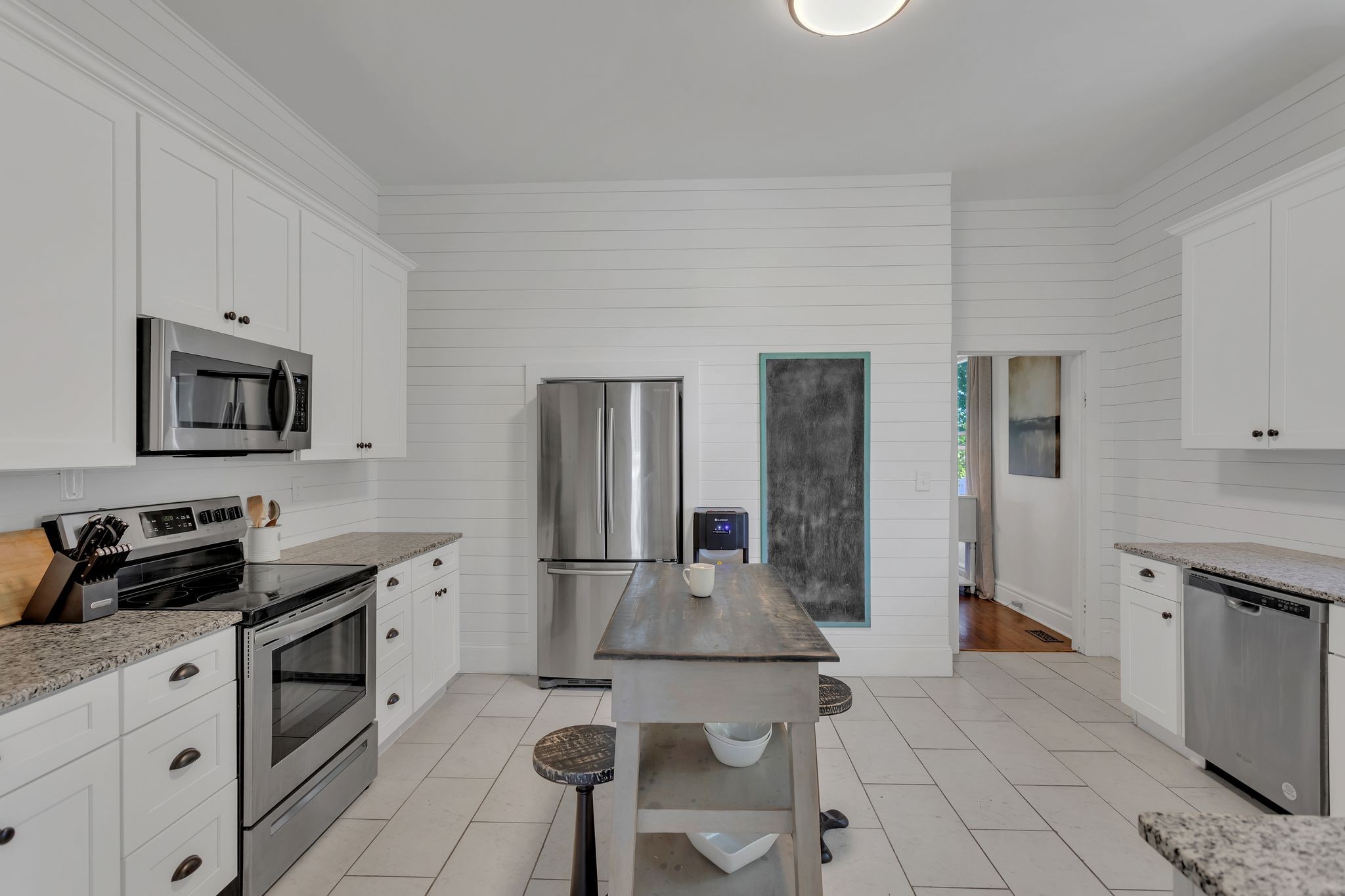 105 3rd Avenue Columbia, TN 38401 - Photo 11 of 21 a kitchen with stainless steel appliances a sink stove and refrigerator