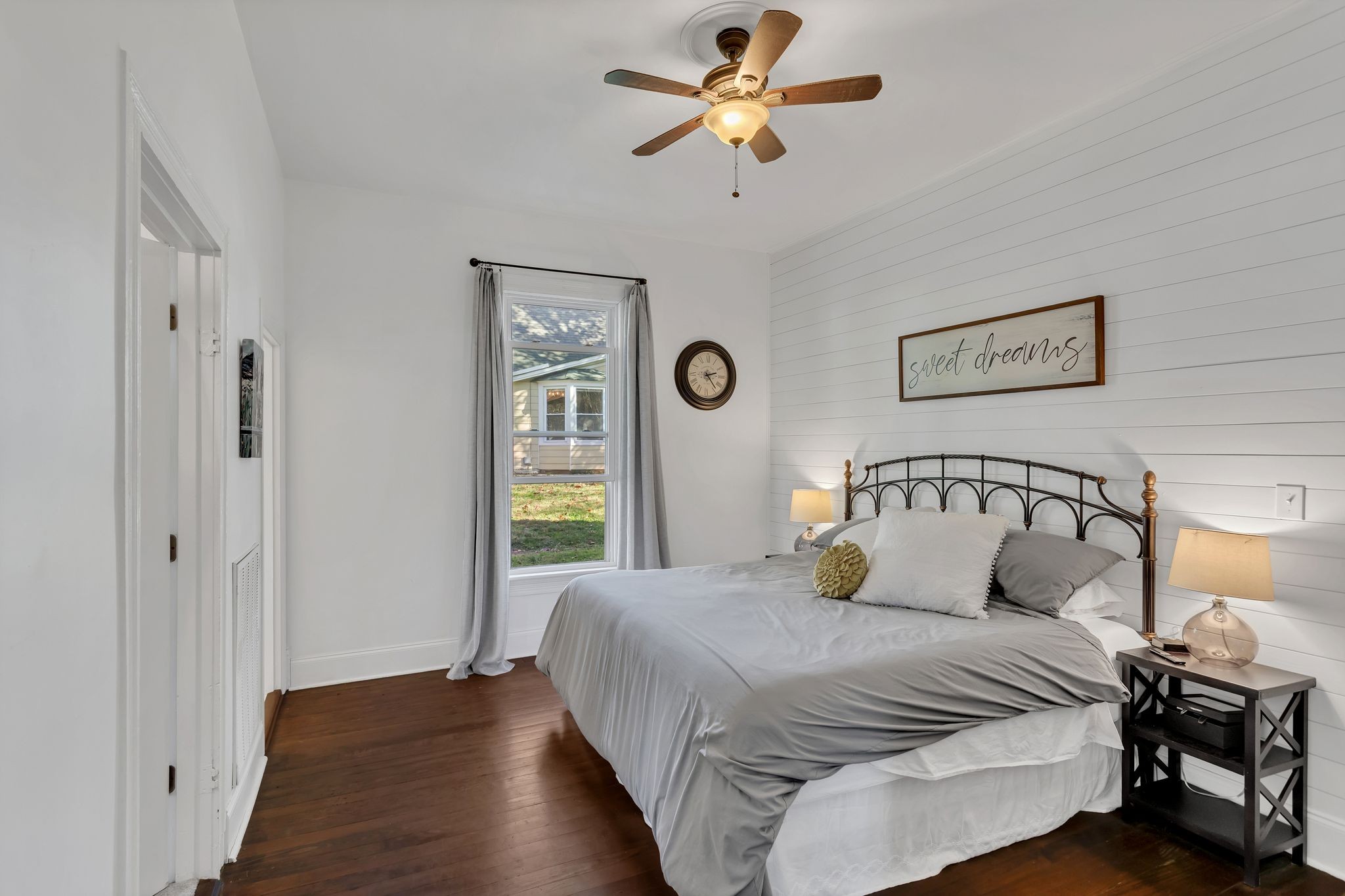 105 3rd Avenue Columbia, TN 38401 - Photo 13 of 21 a bedroom with a bed and wooden floor