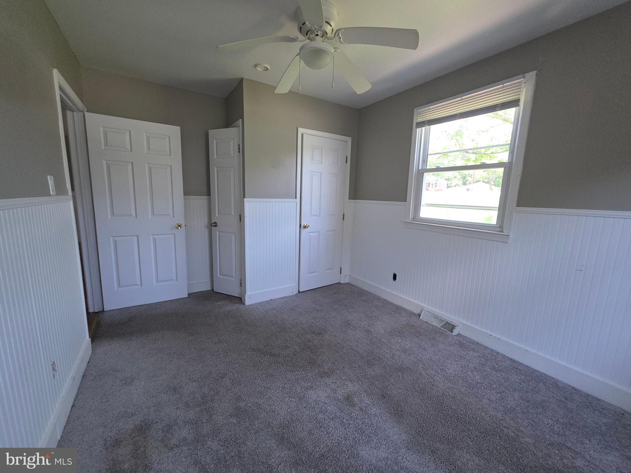 2590 Hallowing Point Road Prince Frederick, MD 20678 - Photo 5 of 10 a view of an empty room with a window