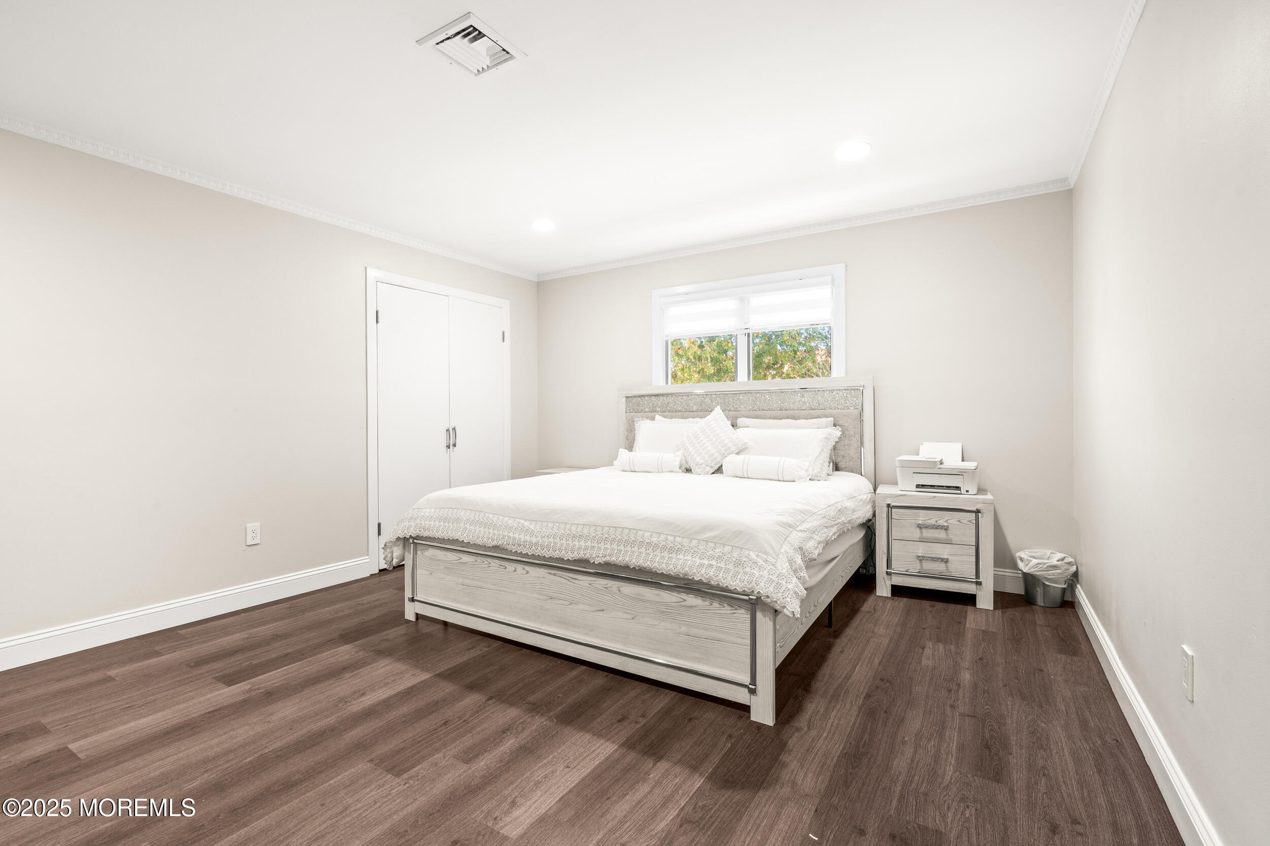 24 Valley Forge Road Eatontown, NJ 07724 - Photo 17 of 23 a bedroom with a bed and a window