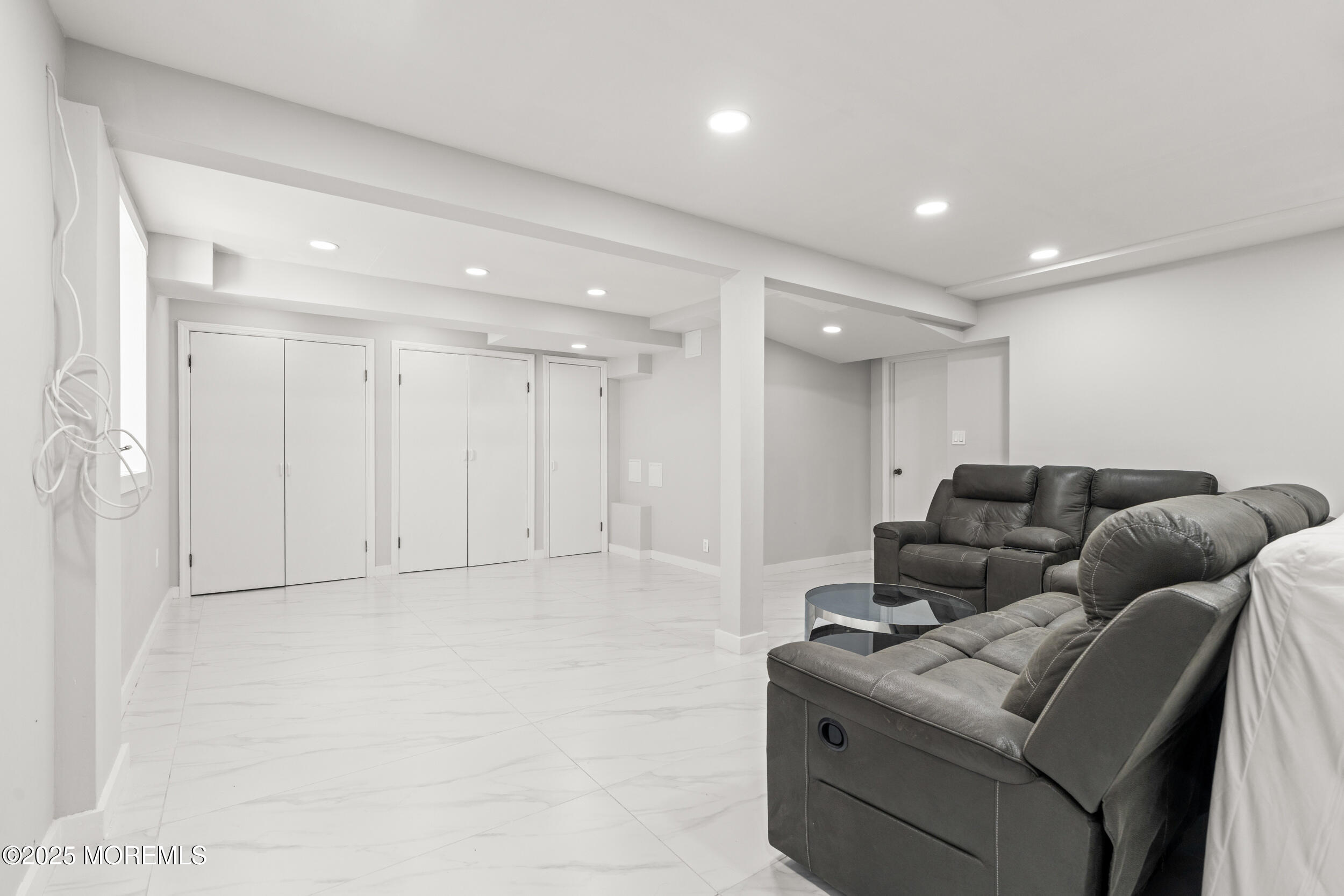 24 Valley Forge Road Eatontown, NJ 07724 - Photo 23 of 23 a living room with furniture and a couch