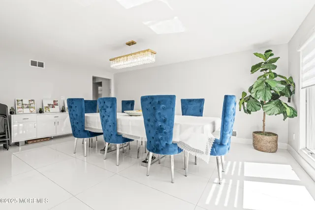 a view of kitchen with furniture and potted plant