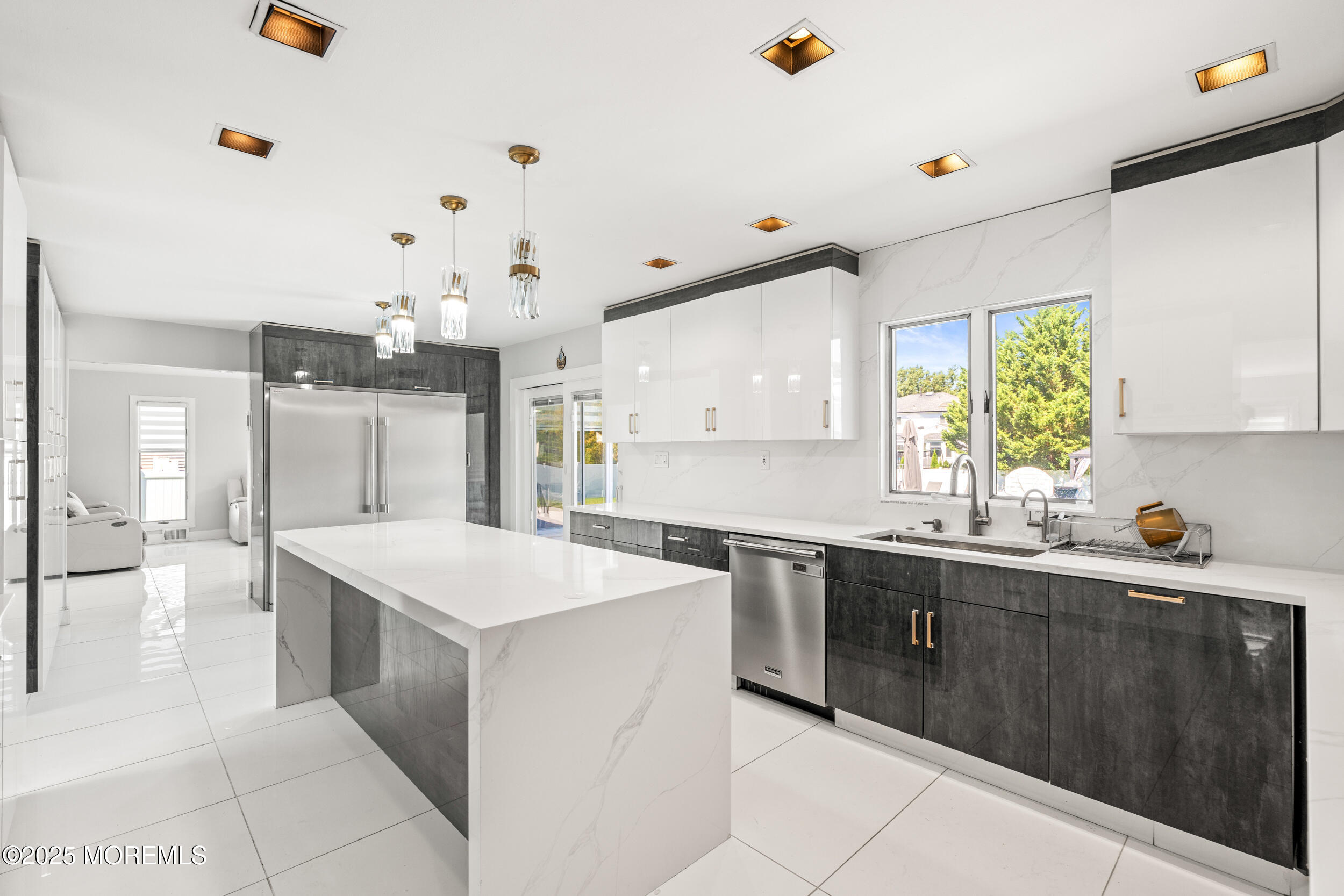 24 Valley Forge Road Eatontown, NJ 07724 - Photo 5 of 23 a kitchen with a sink a counter top space and stainless steel appliances