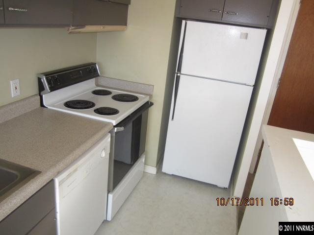 100 North Arlington Avenue, Unit 19H Reno, NV 89501 - Photo 5 of 11 a utility room with dryer and washer