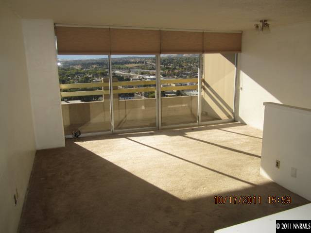 100 North Arlington Avenue, Unit 19H Reno, NV 89501 - Photo 8 of 11 a view of a glass door