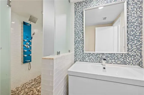 a bathroom with a sink and a bathtub