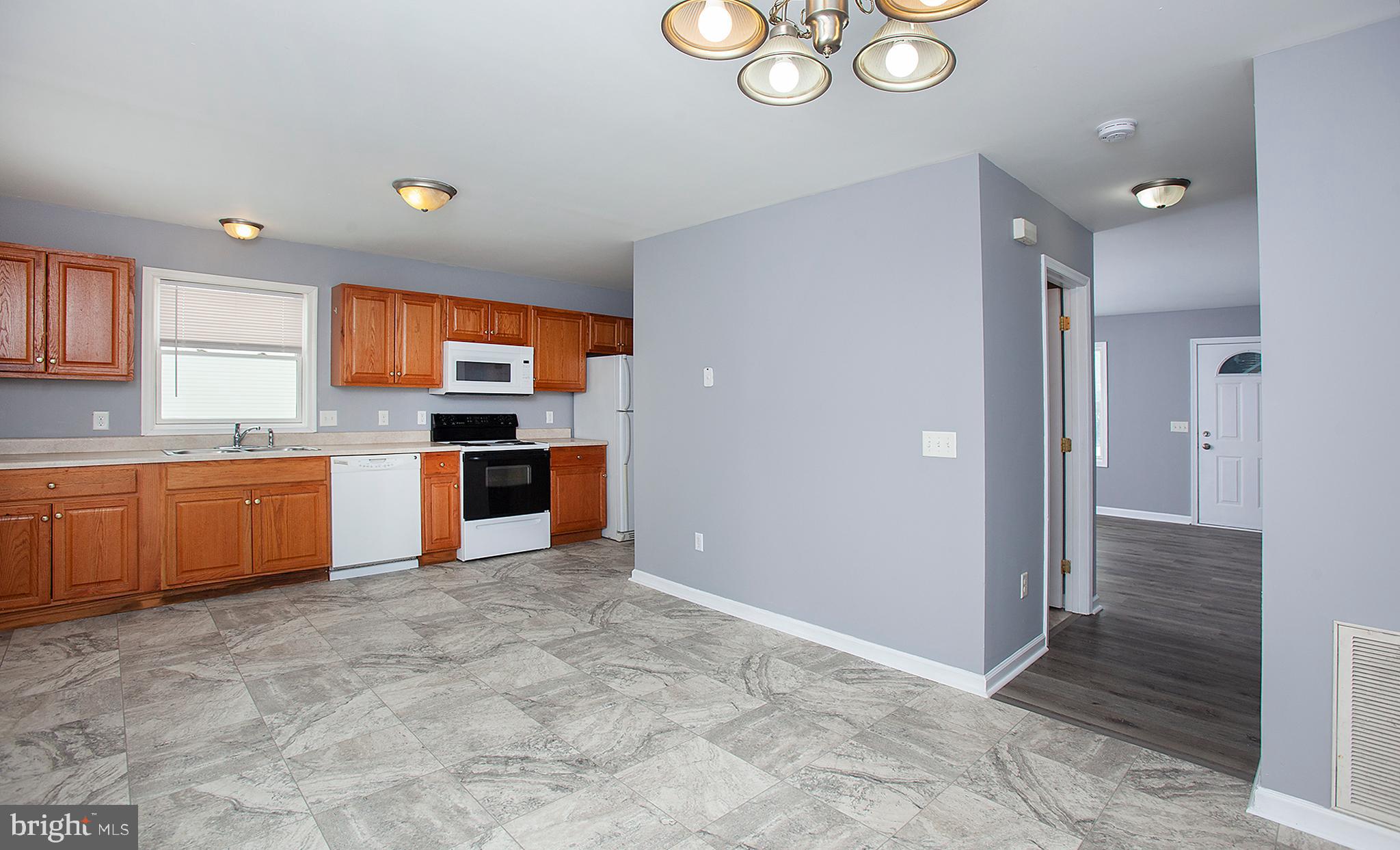 1031 Oberlin Road Middletown, PA 17057 - Photo 12 of 39 a kitchen with a refrigerator and a sink