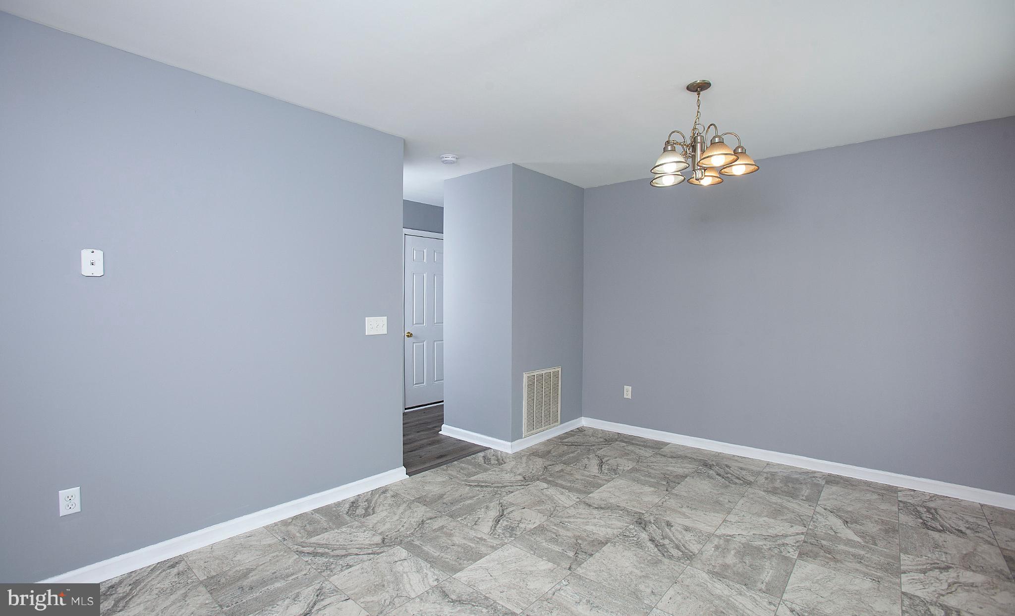 1031 Oberlin Road Middletown, PA 17057 - Photo 13 of 39 wooden floor in an empty room with a window