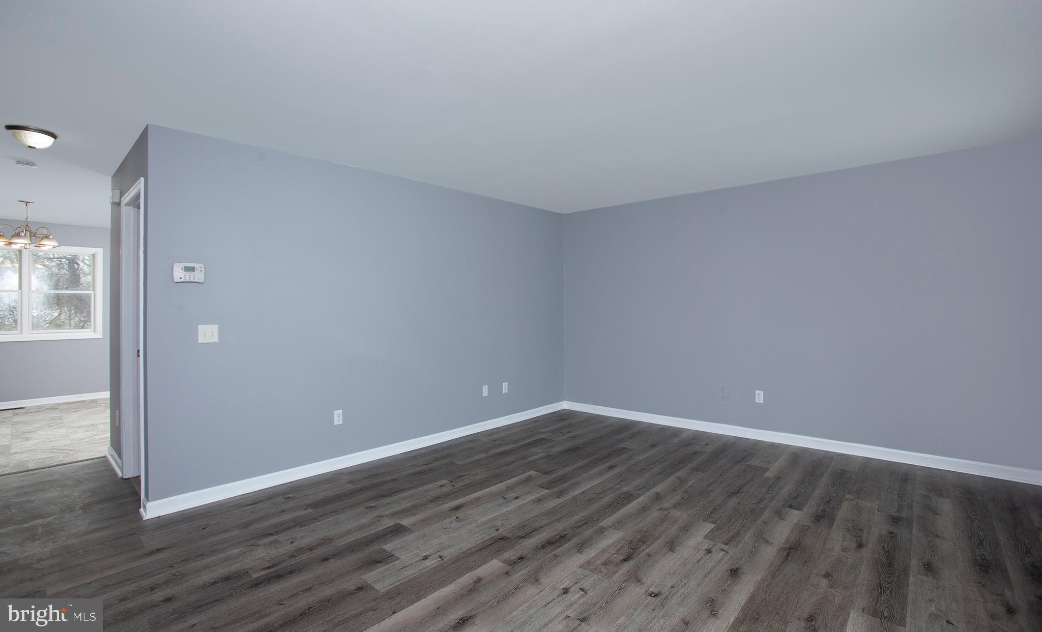 1031 Oberlin Road Middletown, PA 17057 - Photo 17 of 39 a view of room with wooden floor