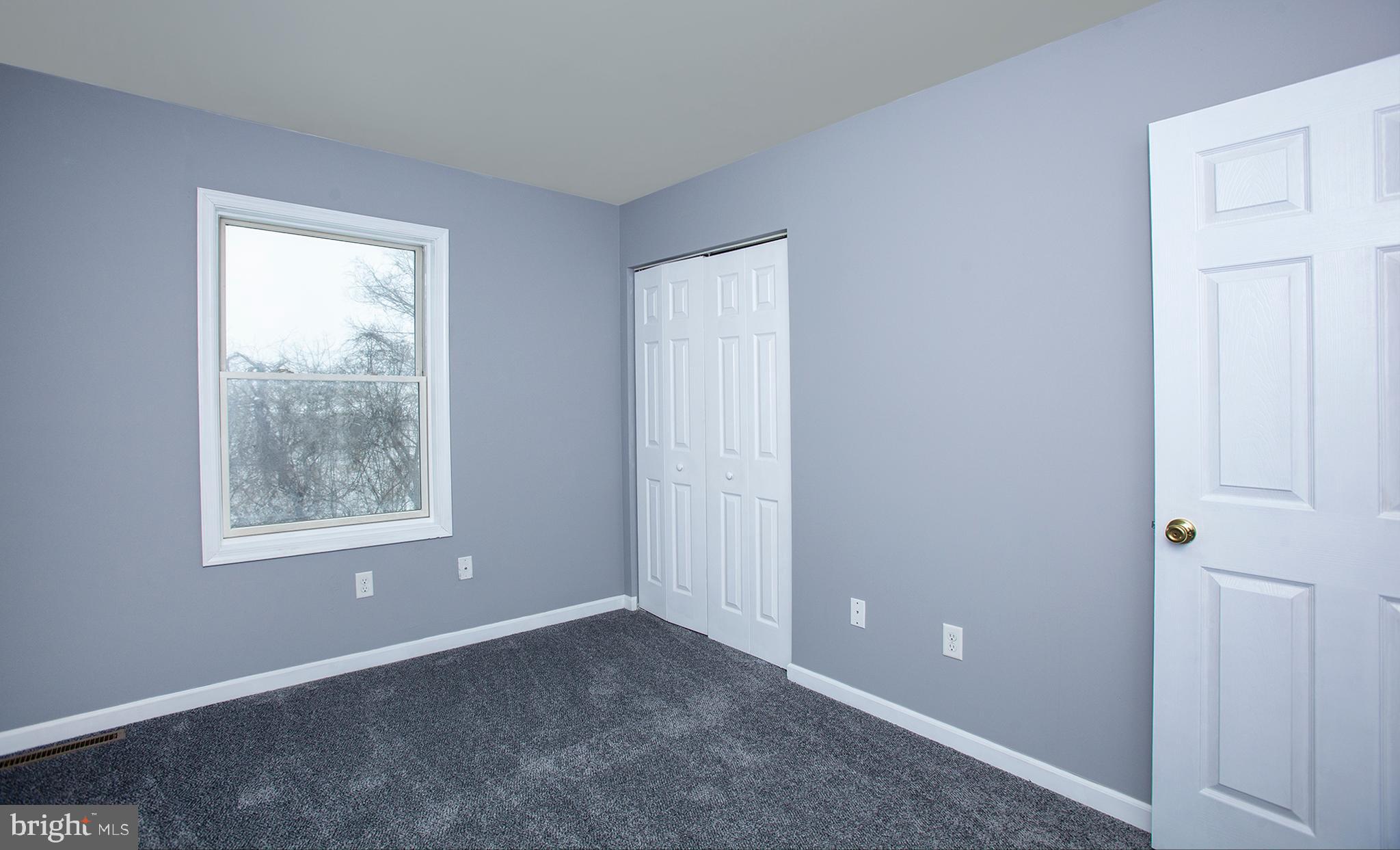 1031 Oberlin Road Middletown, PA 17057 - Photo 24 of 39 an empty room with windows and closet