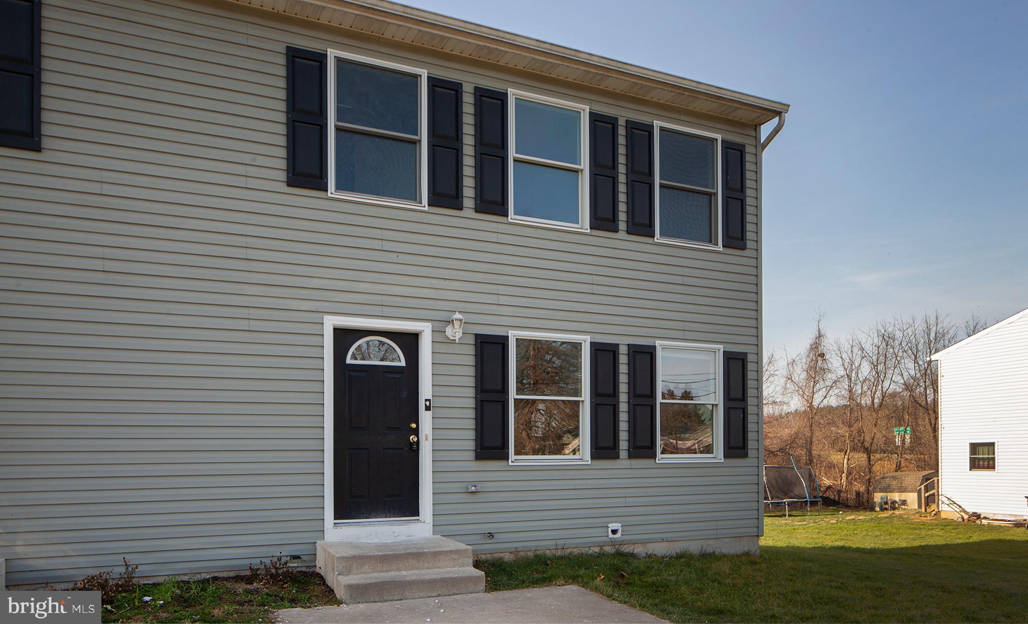 1031 Oberlin Road Middletown, PA 17057 - Photo 4 of 39 a view of a house with many windows and plants