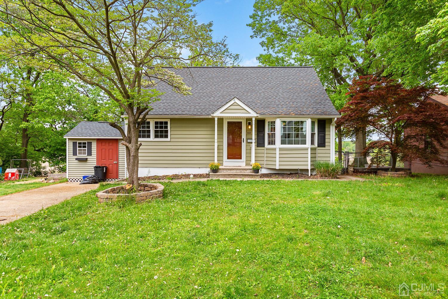 60 Wilcox Road New Brunswick, NJ 08901 - Photo 1 of 25 front view of a house with a yard
