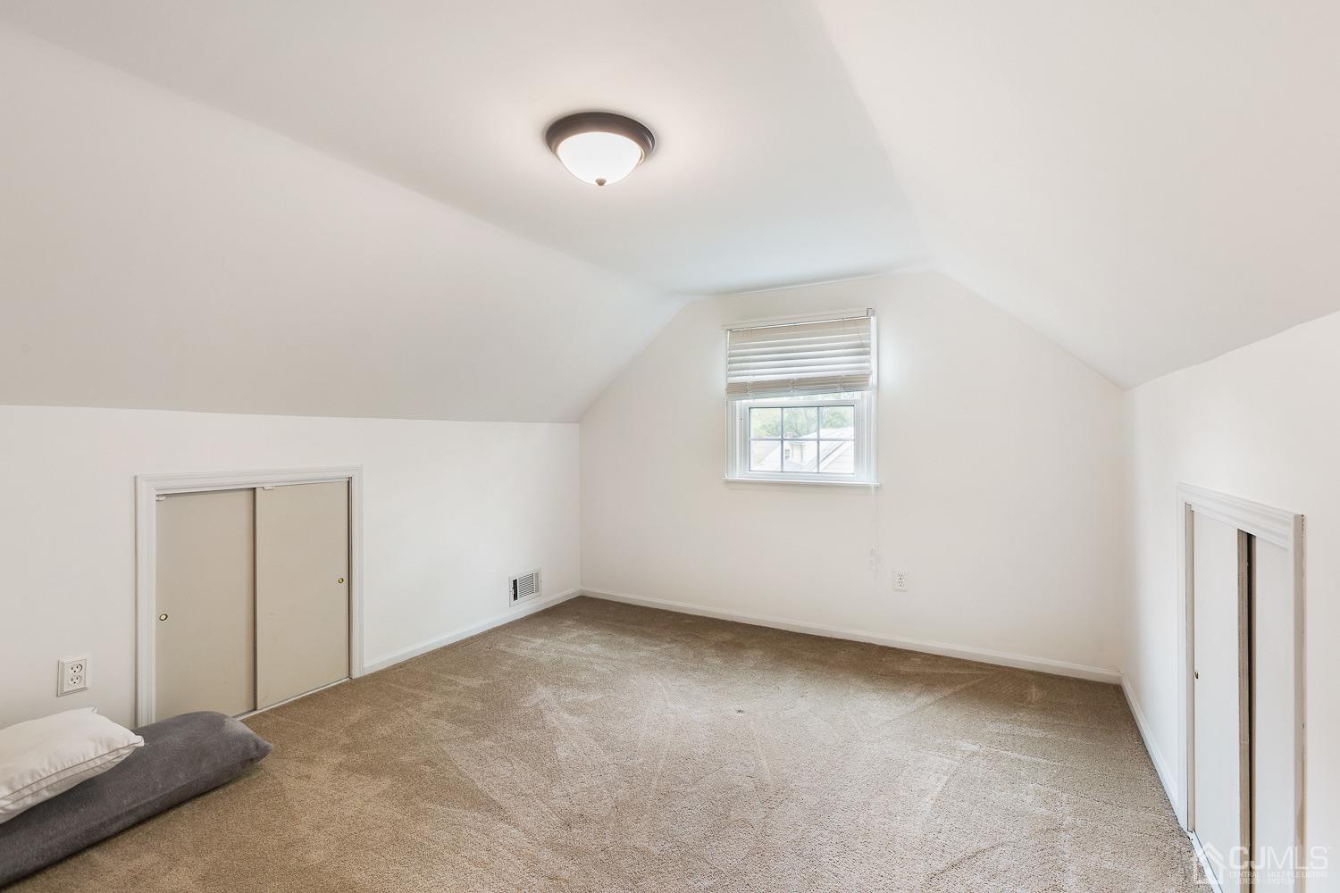 60 Wilcox Road New Brunswick, NJ 08901 - Photo 17 of 25 an empty room with a workbench