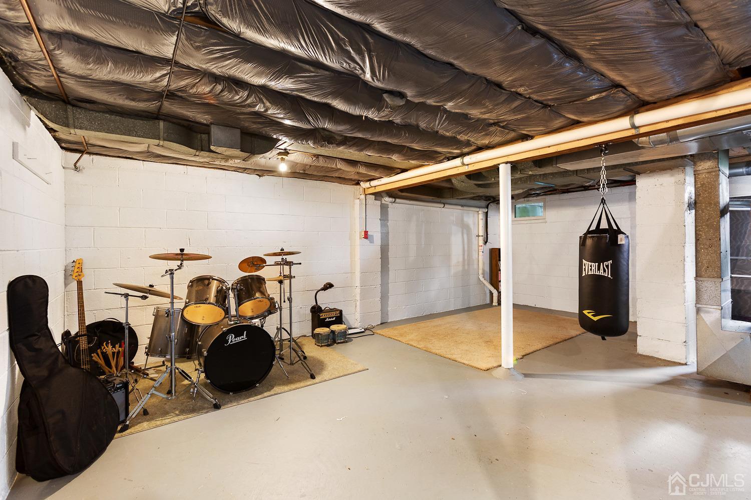 60 Wilcox Road New Brunswick, NJ 08901 - Photo 20 of 25 a view of a garage with cars
