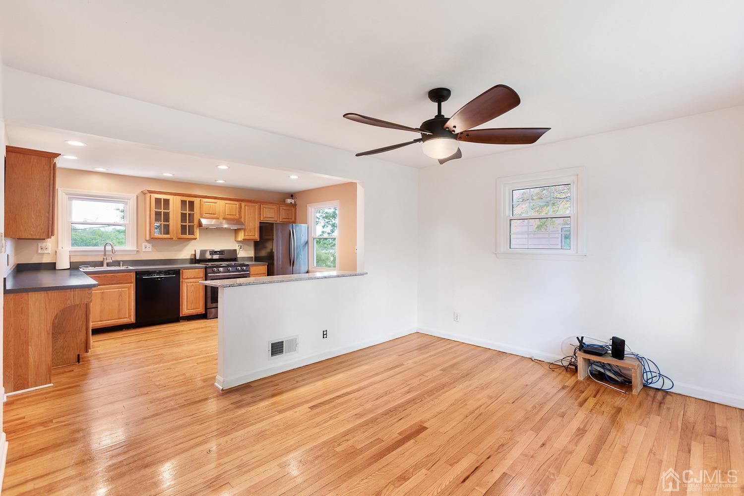 60 Wilcox Road New Brunswick, NJ 08901 - Photo 3 of 25 a view of kitchen with wooden floor and window