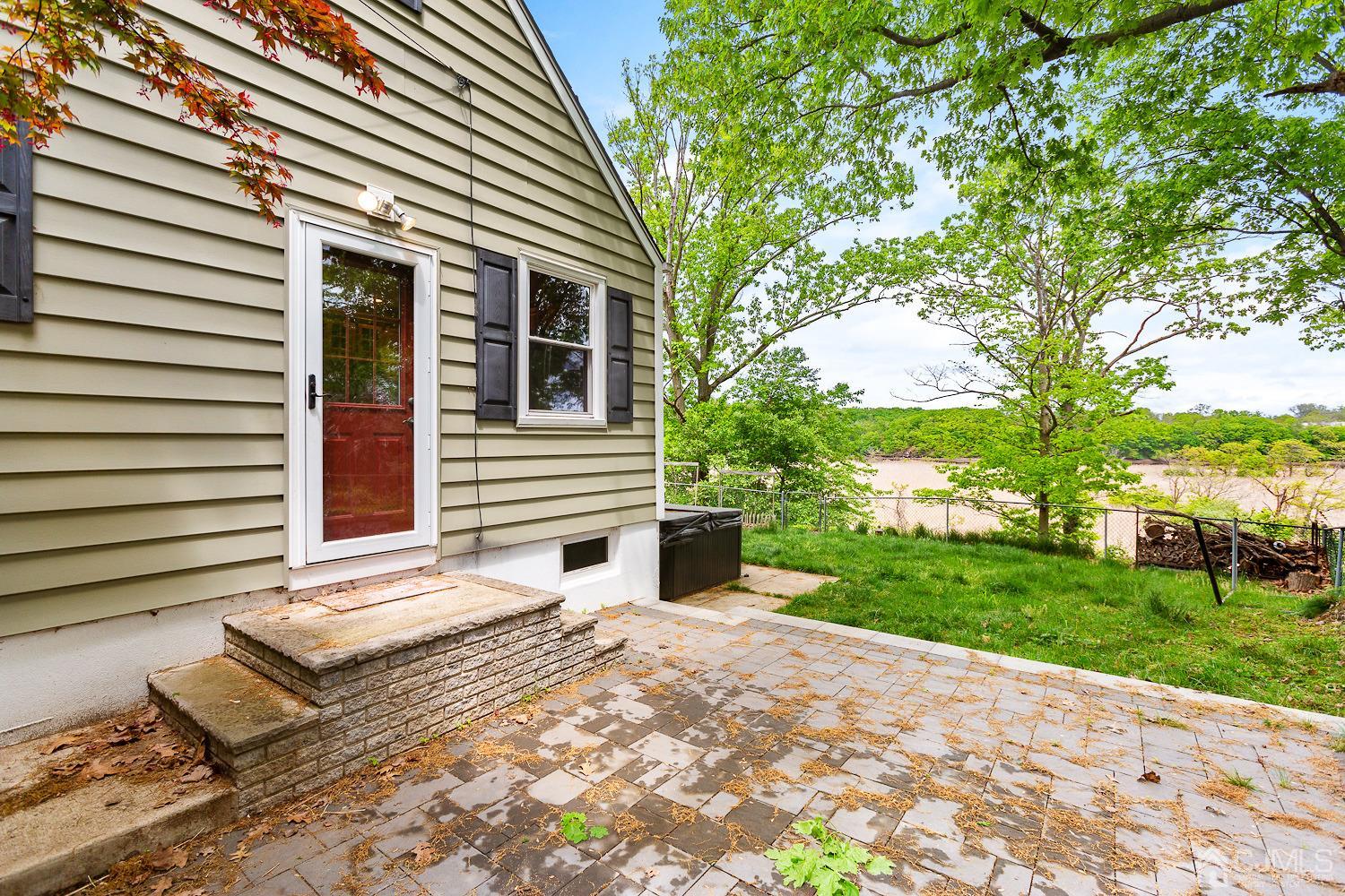 60 Wilcox Road New Brunswick, NJ 08901 - Photo 21 of 25 a front view of a house with garden