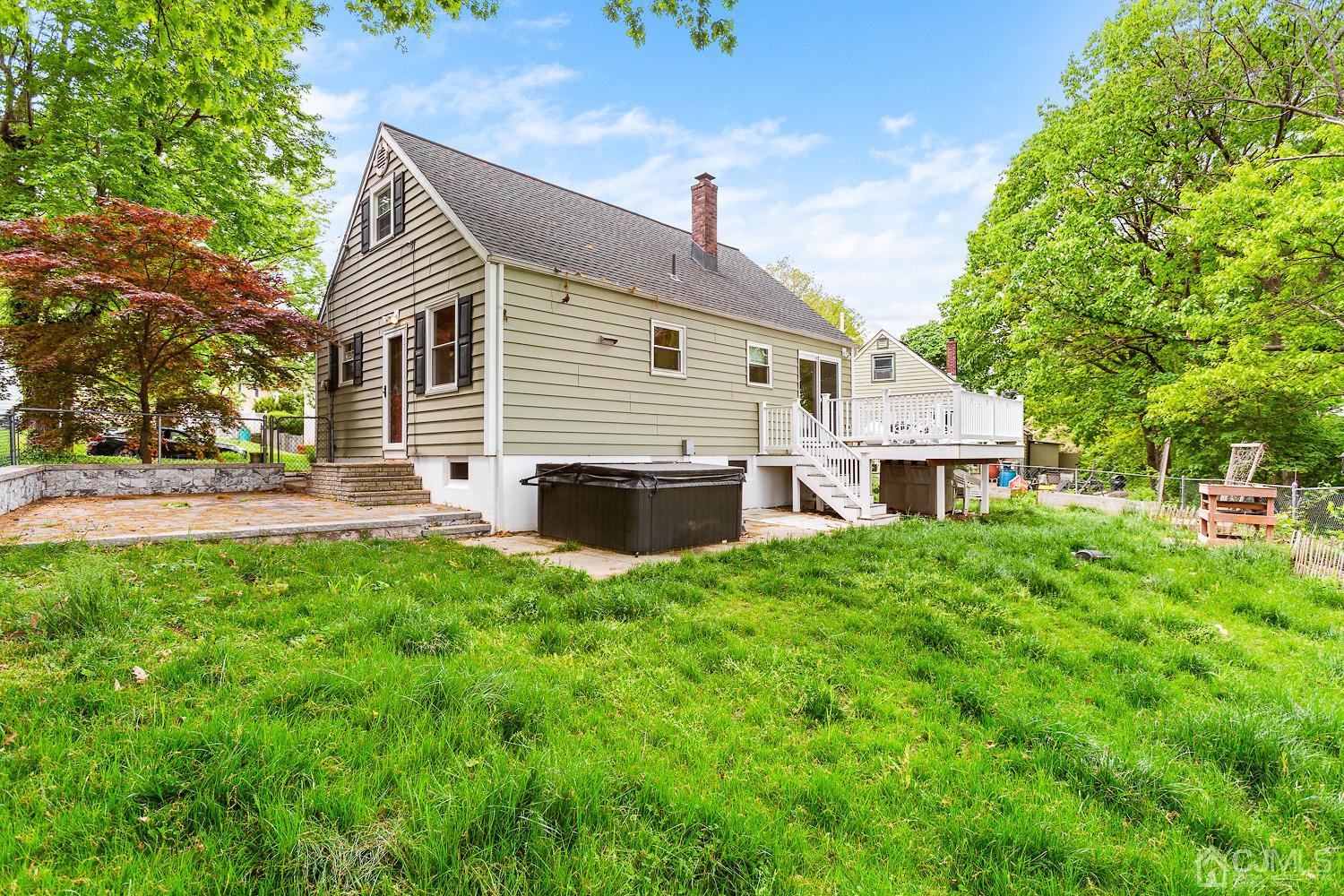 60 Wilcox Road New Brunswick, NJ 08901 - Photo 22 of 25 a view of a house with a backyard