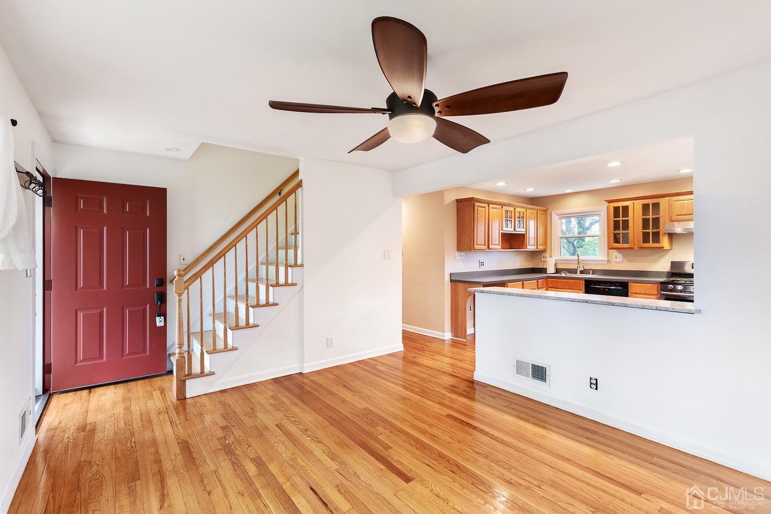 60 Wilcox Road New Brunswick, NJ 08901 - Photo 4 of 25 a view of kitchen and hall with wooden floor