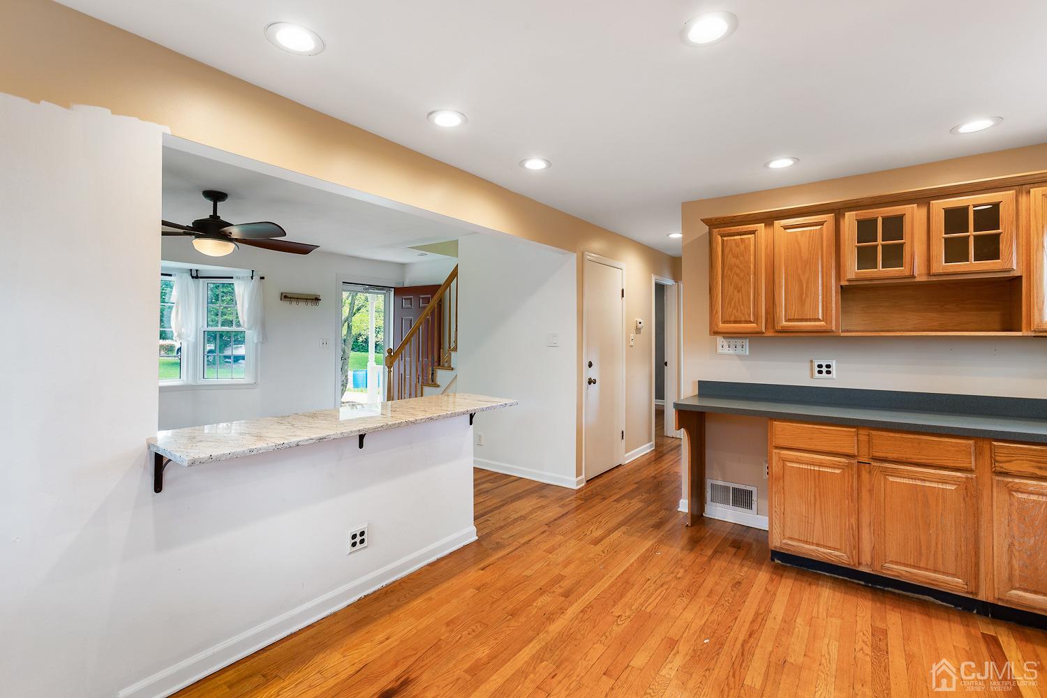 60 Wilcox Road New Brunswick, NJ 08901 - Photo 9 of 25 a kitchen with stainless steel appliances granite countertop a sink and cabinets