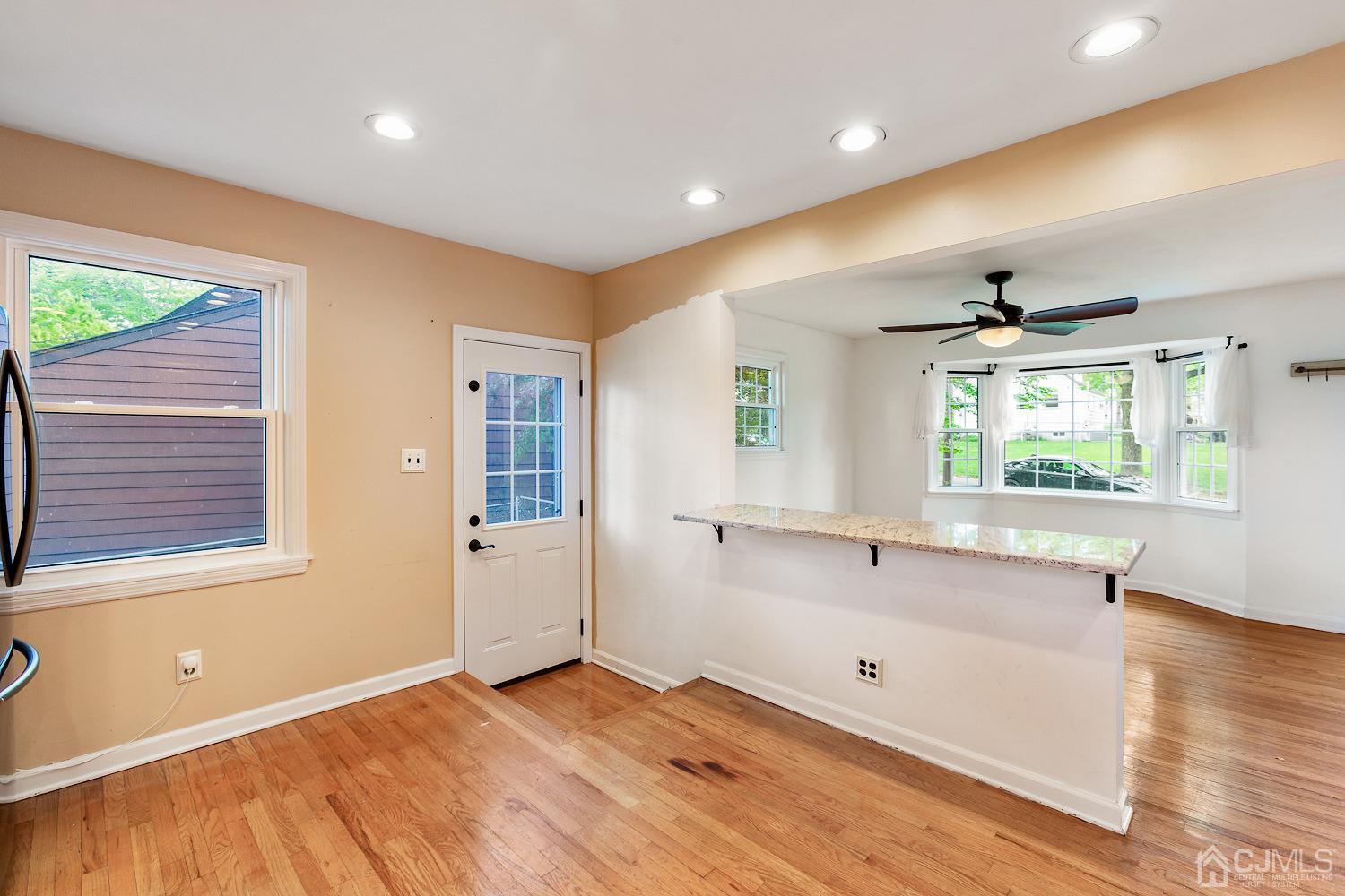 60 Wilcox Road New Brunswick, NJ 08901 - Photo 10 of 25 a view of an empty room with wooden floor and a window