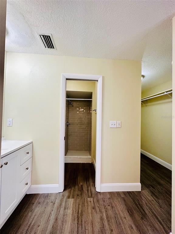 8002 Hibiscus Drive, Unit 8002 Temple Terrace, FL 33637 - Photo 13 of 16 a view of hallway with wooden floor