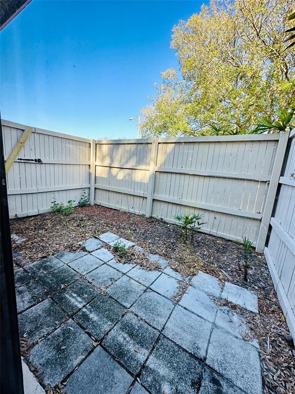 8002 Hibiscus Drive, Unit 8002 Temple Terrace, FL 33637 - Photo 16 of 16 a view of a backyard