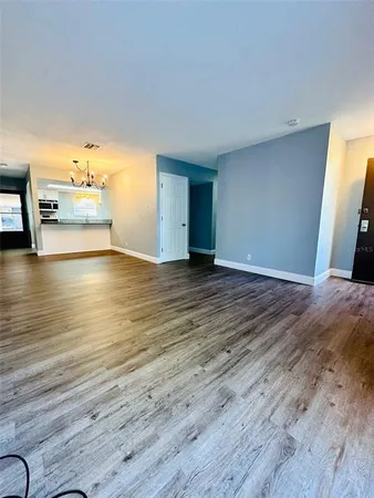 a view of a livingroom with an empty room