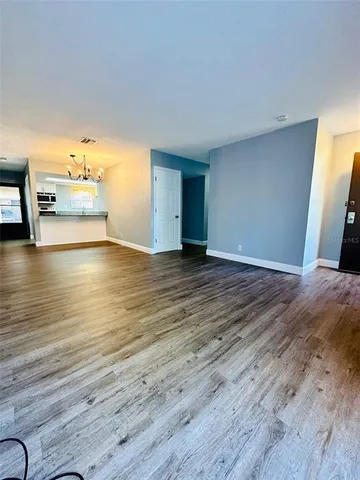 a view of a livingroom with an empty room