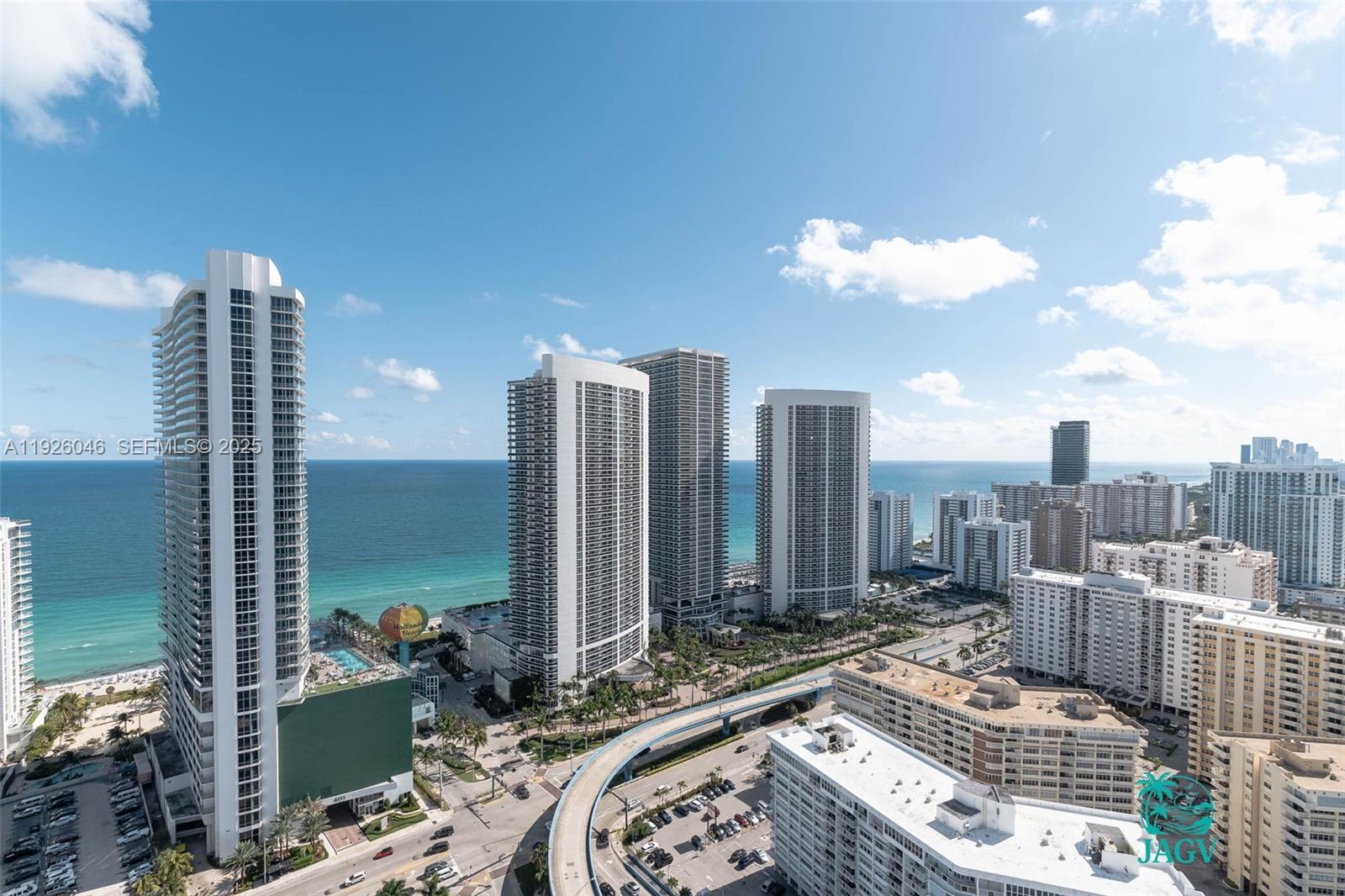 4010 South Ocean Drive, Unit R3005 Hollywood, FL 33019 - Photo 15 of 57 a city view with tall buildings
