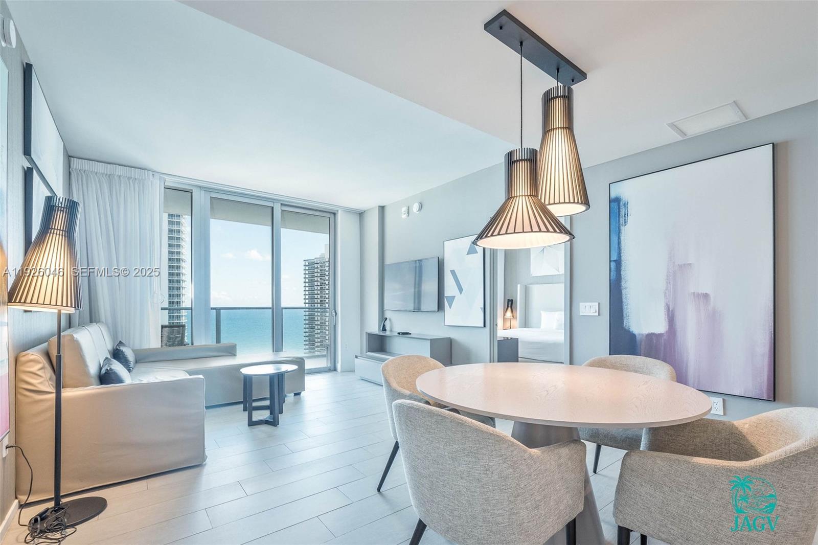 4010 South Ocean Drive, Unit R3005 Hollywood, FL 33019 - Photo 40 of 57 a dining room with furniture and window