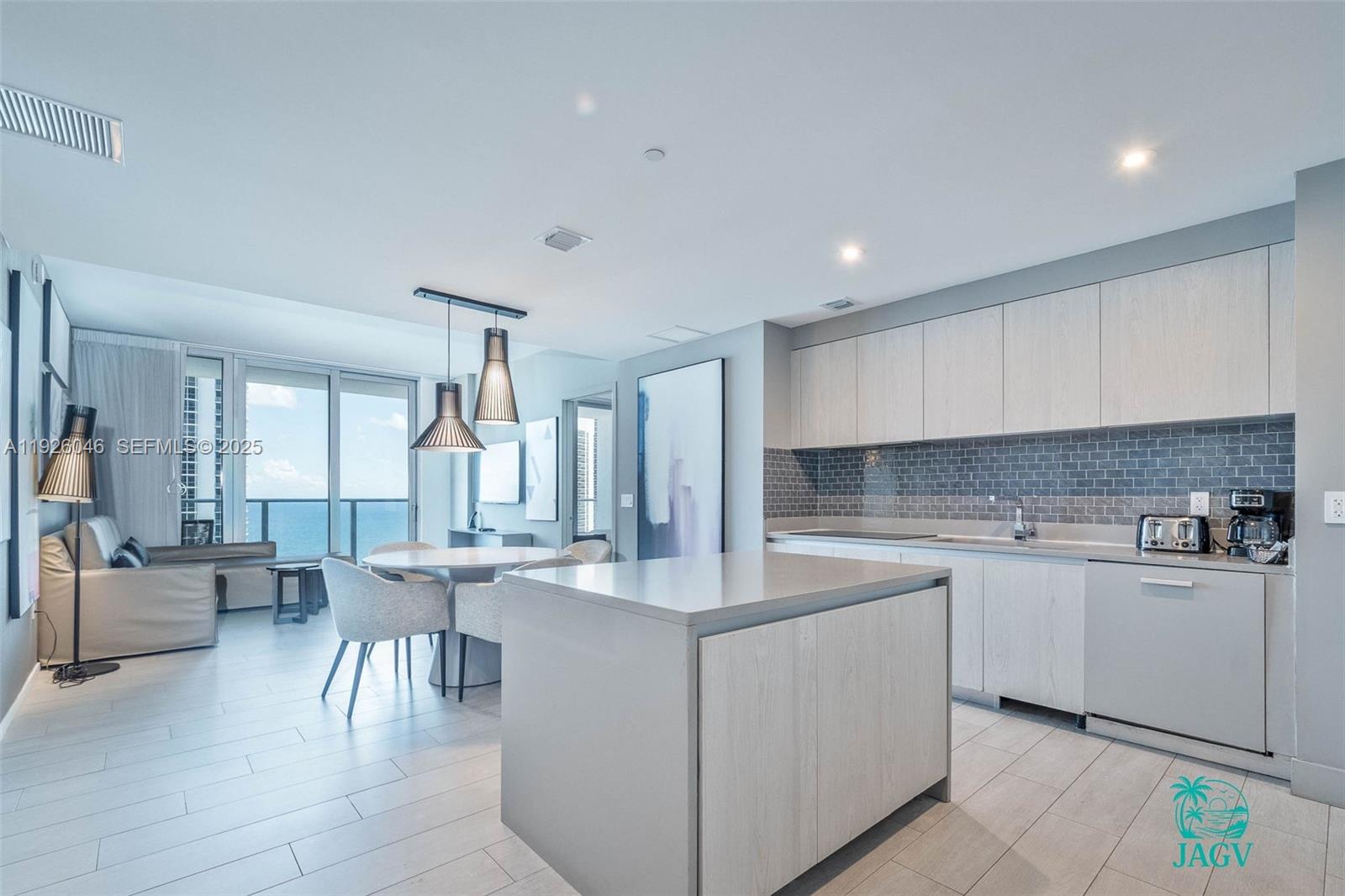 4010 South Ocean Drive, Unit R3005 Hollywood, FL 33019 - Photo 47 of 57 a kitchen with a sink and cabinets