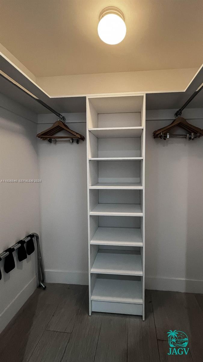 4010 South Ocean Drive, Unit R3005 Hollywood, FL 33019 - Photo 53 of 57 a view of walk in closet with empty racks