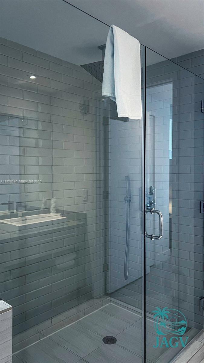 4010 South Ocean Drive, Unit R3005 Hollywood, FL 33019 - Photo 55 of 57 a bathroom with a shower