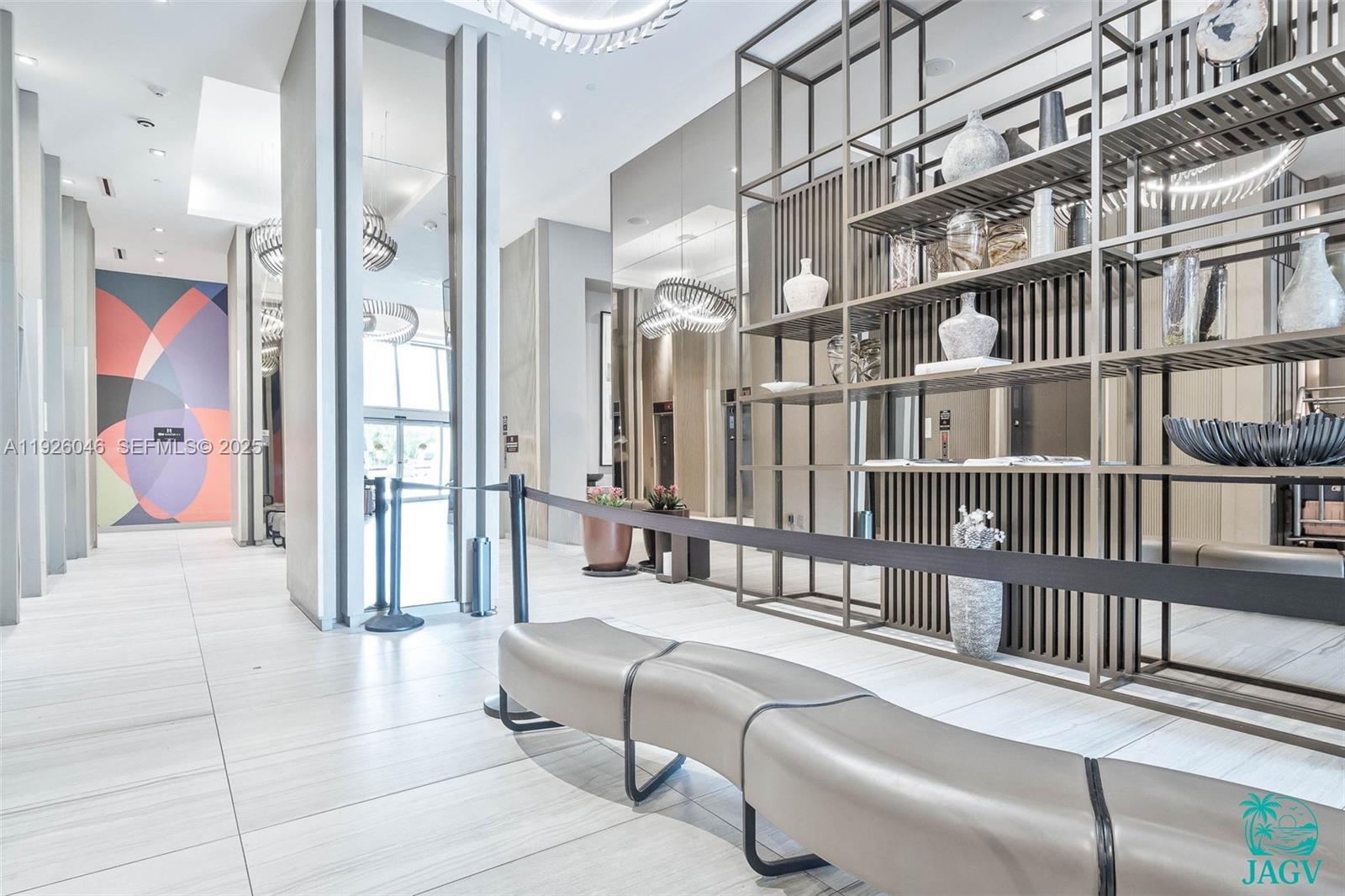 4010 South Ocean Drive, Unit R3005 Hollywood, FL 33019 - Photo 8 of 57 a living room with furniture