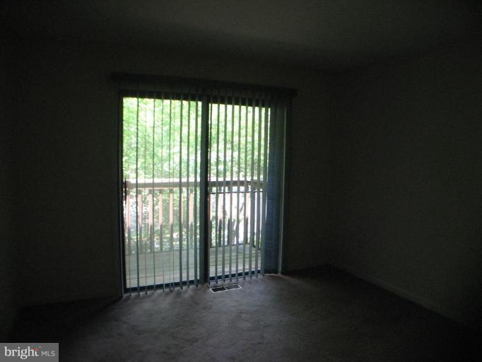 1984 Winterport Cluster Reston, VA 20191 - Photo 17 of 21 3rd bedroom with attached balcony
