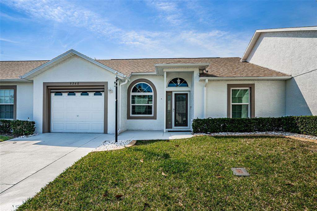 9340 Santa Monica Way New Port Richey, FL 34655 - Photo 1 of 1 a house view with a outdoor space