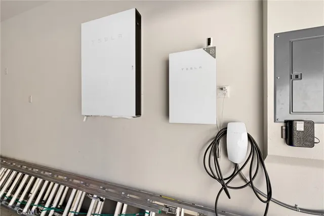 a bathroom with a shower and mirror