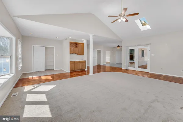 a kitchen with stainless steel appliances a refrigerator and a stove top oven