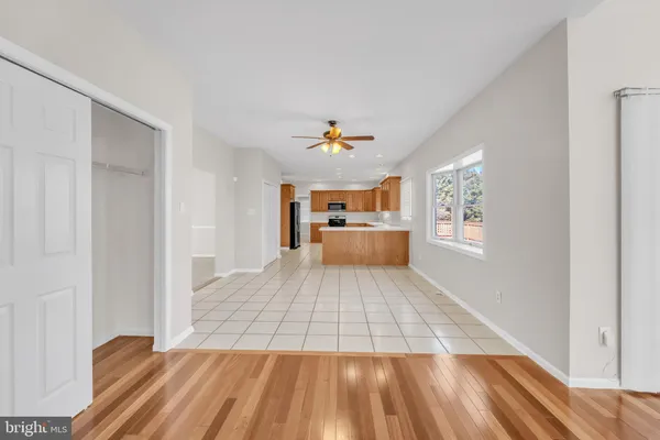 a view of a bathroom with sink and mirror