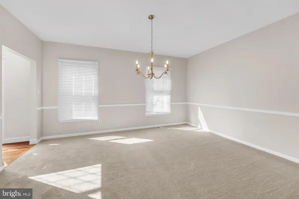 a bathroom with a toilet sink and shower
