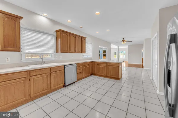 a view of a chandelier fan in a room