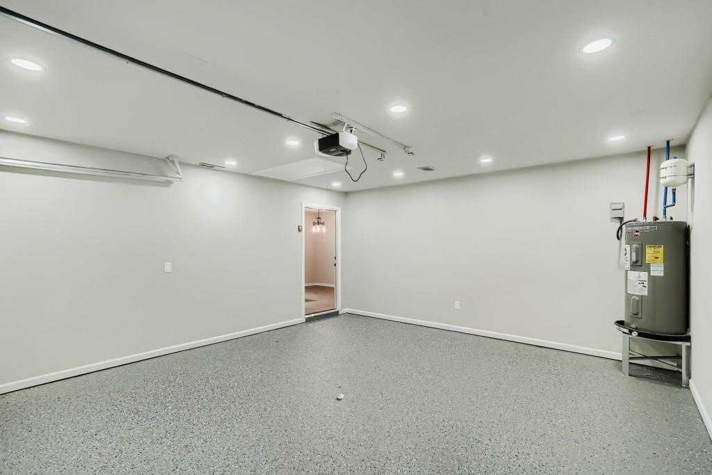 2021 Irwin Bridge Road Northwest Conyers, GA 30012 - Photo 38 of 43 an empty room with a empty space and windows