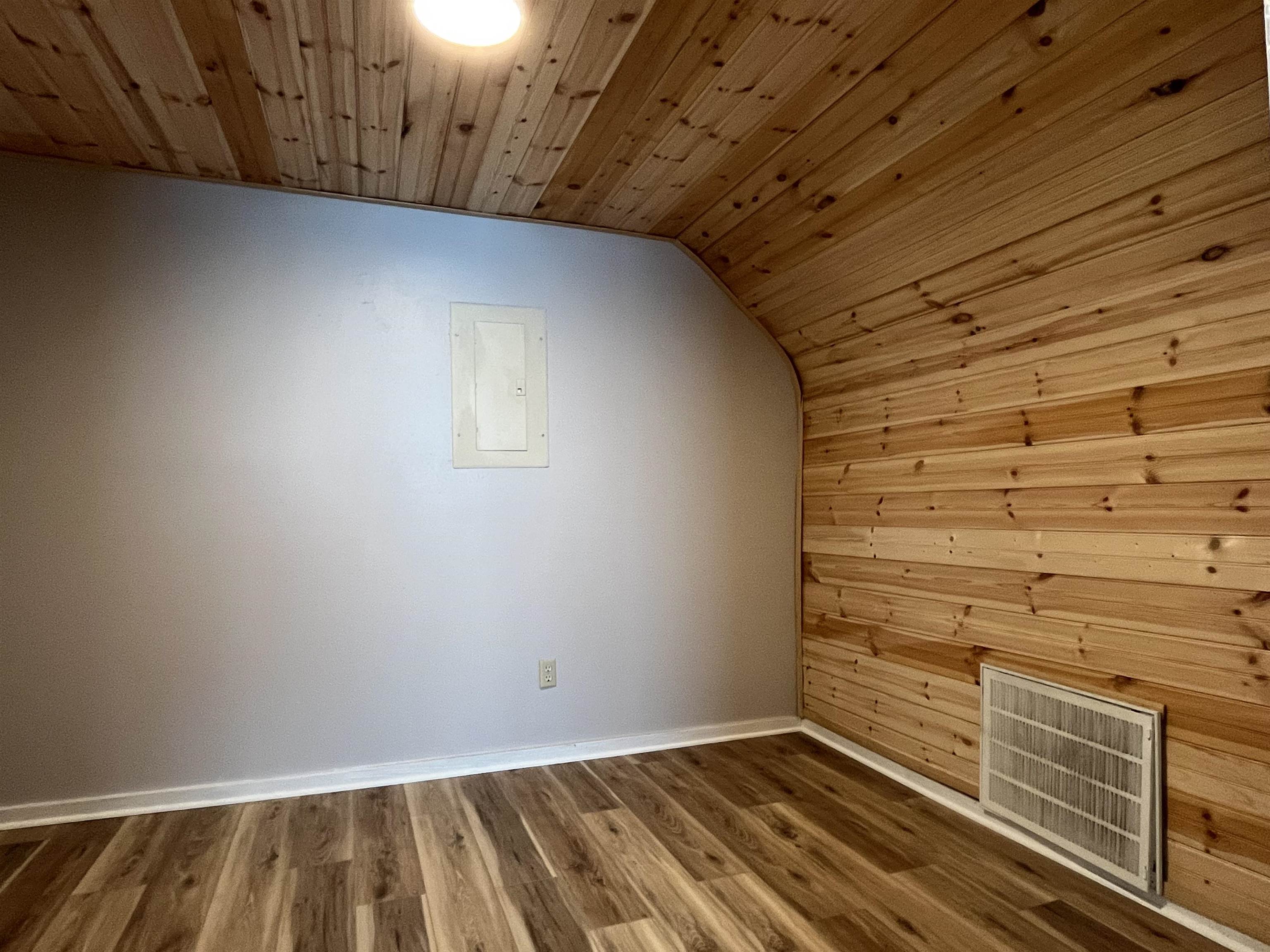 116 Bridge Street, Unit 1 St. Augustine, FL 32084 - Photo 8 of 8 a view of wooden floor