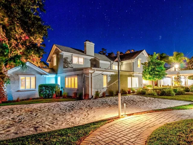 a view of a livingroom with an empty space and a fireplace