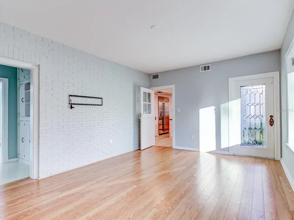 a bathroom with a sink mirror toilet and shower